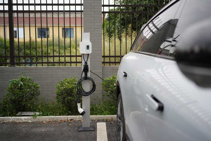 use a charger to charge electric car